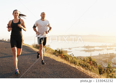 Morning, fitness and couple running as exercise or workout for health and wellness together in sunrise. Sport, man and woman runner run with athlete as training listening to sports music for energy 133042232