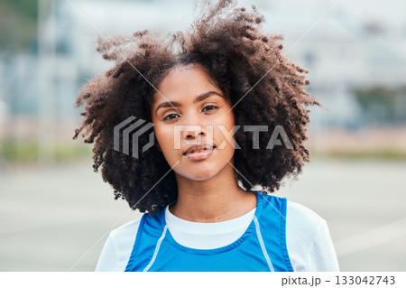 Sports, portrait and netball player on the court for an outdoor game, competition or training. Fitness, health and female athlete from Puerto Rico standing on a field after practice or a match. Sports, portrait and netball player on the court for an outdoor game, competition or training. Fitness, health and female athlete from Puerto Rico standing on a field after practice or a match. 133042743