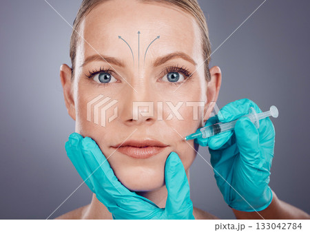 Plastic surgery, beauty and portrait of woman with injection for lip filler, cosmetics and lines in studio. Skincare, dermatology and girl with needle for anti aging, face lift and facial treatment Plastic surgery, beauty and portrait of woman with injection for lip filler, cosmetics and lines in studio. Skincare, dermatology and girl with needle for anti aging, face lift and facial treatment 133042784