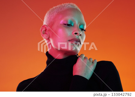Skincare, makeup and woman with neon lights, cosmetics and confident girl on studio background. Female, lady and beauty for wellness, creative and vibrant face paint, art and cyber punk om backdrop Skincare, makeup and woman with neon lights, cosmetics and confident girl on studio background. Female, lady and beauty for wellness, creative and vibrant face paint, art and cyber punk om backdrop 133042792
