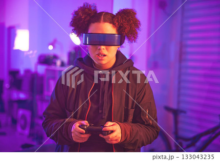 Metaverse, virtual reality and gaming girl with gamepad, innovation and vr media in neon lighting at night. Female gamer, cyberspace tech and glasses for 3D experience, digital AR fantasy and gen z Metaverse, virtual reality and gaming girl with gamepad, innovation and vr media in neon lighting at night. Female gamer, cyberspace tech and glasses for 3D experience, digital AR fantasy and gen z 133043235