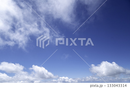 blue sky background with tiny clouds in sunny day blue sky background with tiny clouds in sunny day 133043314