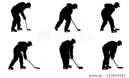 Ice Hockey Linesman Dropping Puck Silhouette Ice Hockey Linesman Dropping Puck Silhouette 133044561