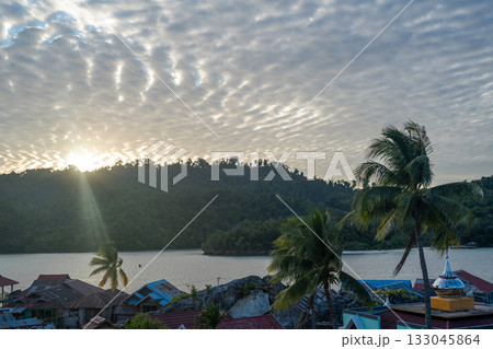 Sunset over Pulau Papan mosque and village, Malenge, Sulawesi, Indonesia Sunset over Pulau Papan mosque and village, Malenge, Sulawesi, Indonesia 133045864