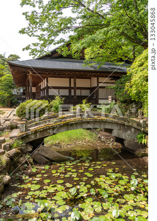 Zenno-ji Temple and stone bridge surrounded by greenery in Takayama Zenno-ji Temple and stone bridge surrounded by greenery in Takayama 133045868