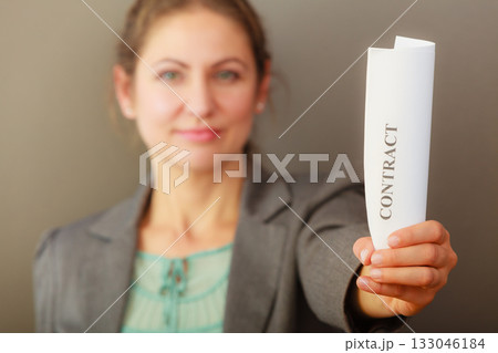 Business woman showing contract Business woman showing contract 133046184