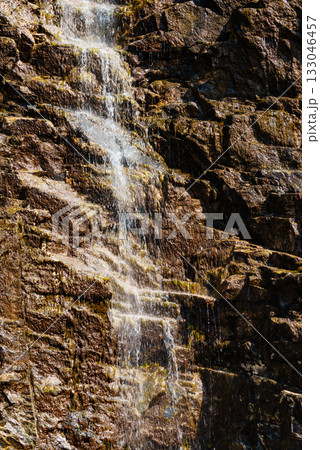 Little waterfall in mountains, Norway. 133046457