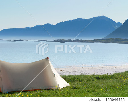 Seascape with tent on beach, Lofoten Norway Seascape with tent on beach, Lofoten Norway 133046553