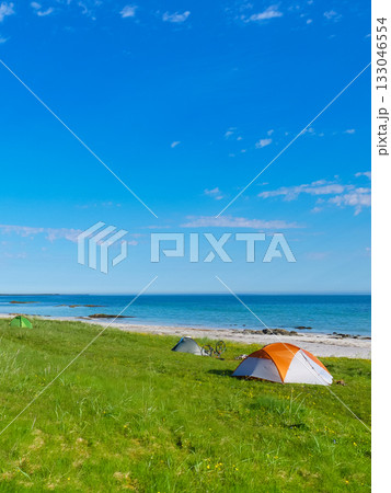 Seascape with tent on beach, Lofoten Norway Seascape with tent on beach, Lofoten Norway 133046554
