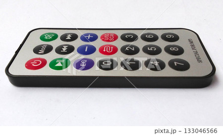Compact multimedia remote control with white background Compact multimedia remote control with white background 133046566