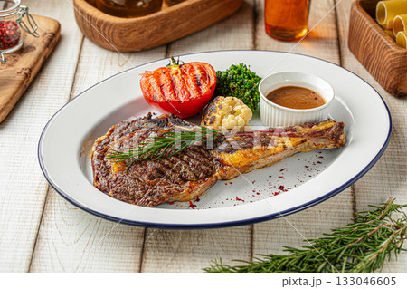 Grilled ribeye steak with vegetables Grilled ribeye steak with vegetables 133046605