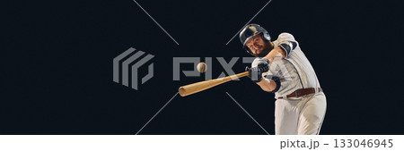 Baseball player making clean contact with ball during timing accuracy drill. Banner 133046945