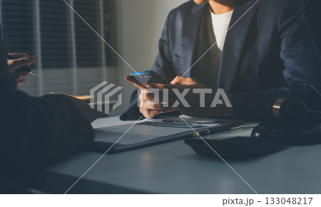 Lawyer explained to the client about the law that must be brought against the court case. Lawyer explained to the client about the law that must be brought against the court case. 133048217