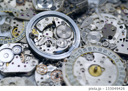 Old mechanical watches with gears and cogs. Watch or clock mechanisms 133049426