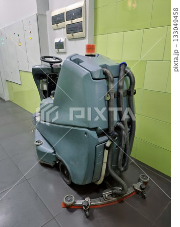 Self-propelled floor scrubber with operator seat. Ride-on floor scrubber machine Self-propelled floor scrubber with operator seat. Ride-on floor scrubber machine 133049458