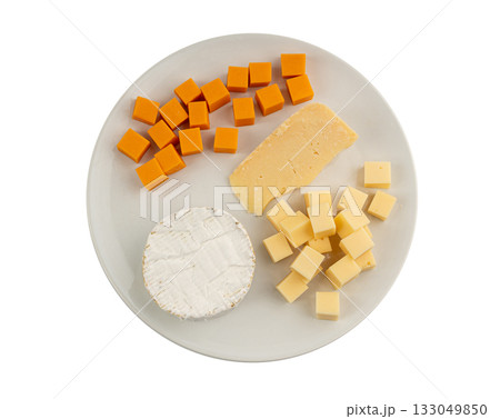 Cheese plate of color cheeses variety, yellow, white and blue cheese board, assorted dairy products Cheese plate of color cheeses variety, yellow, white and blue cheese board, assorted dairy products 133049850