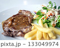 Close up of Grilled beef steak, boiled french fries and vegetable salad;Selective focus 133049974