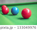 Close up Snooker balls on a green table focus on blue 133049976