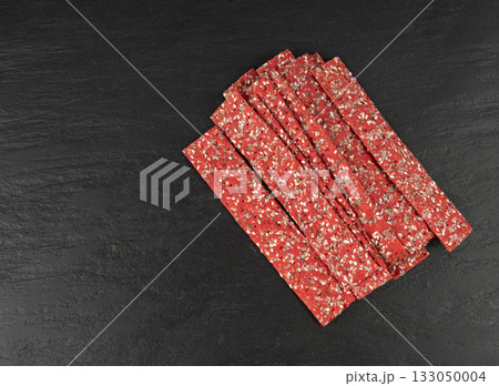 Beetroot crackers, thin rusk beet root bread, red diet multigrain crispbread, various seeds 133050004