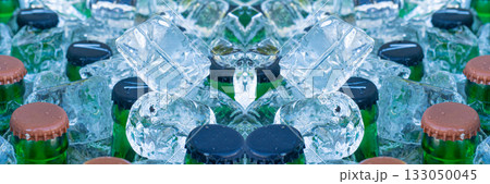 Beer Bottles in Ice Cubes, Many Cold Bottle Caps in Box, Iced Chilled Beer Chest, Different Cold Bottles 133050045