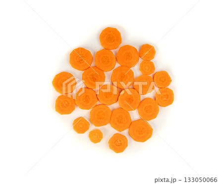Round carrot slices isolated. Sweet orange vegetable cuts, fresh carrot circles pile Round carrot slices isolated. Sweet orange vegetable cuts, fresh carrot circles pile 133050066