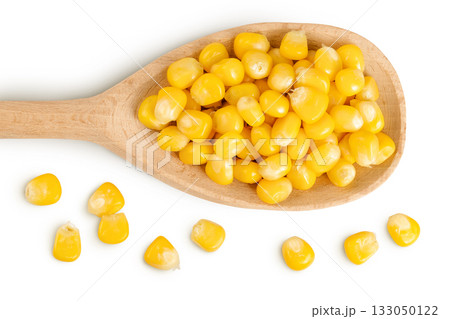 corn seeds in wooden spoon isolated on white background. Top view. Flat lay 133050122