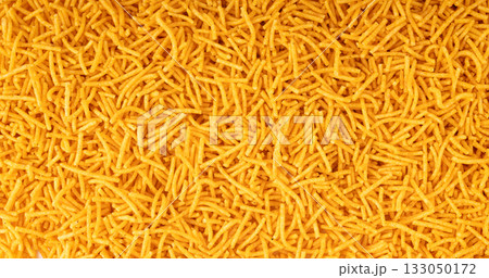Aloo bhujia indian snack isolated. Crispy potato and chickpea flour strips, alu bhujiya sev 133050172