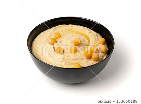 Hummus in bowl, houmous dip, chickpea humus tahini sauce, middle eastern spread Hummus in bowl, houmous dip, chickpea humus tahini sauce, middle eastern spread 133050189