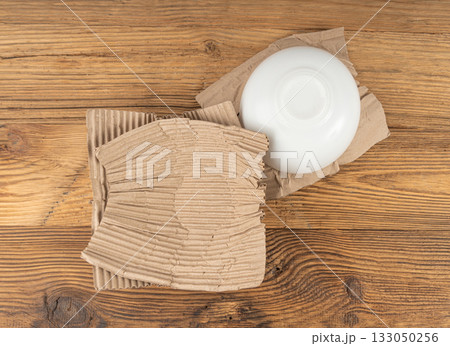 Eco paper packaging texture background, crumpled biodegradable cardboard packing Eco paper packaging texture background, crumpled biodegradable cardboard packing 133050256