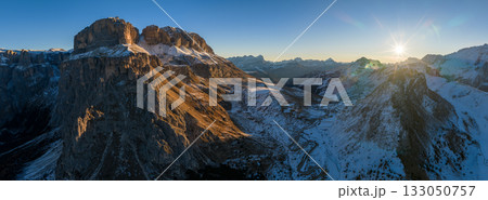 Panorama of the Dolomites mountains during autumn sunrise. Beautiful mountians of Alpi Dolomiti in Italy, South Tirol Panorama of the Dolomites mountains during autumn sunrise. Beautiful mountians of Alpi Dolomiti in Italy, South Tirol 133050757