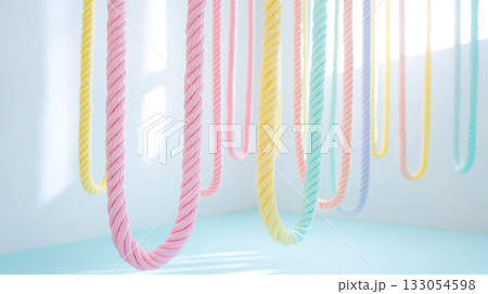 白い部屋に垂れ下がるカラフルなパステルカラーのロープ 白い部屋に垂れ下がるカラフルなパステルカラーのロープ 133054598