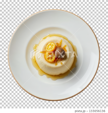 Elegant Nutmeg Cremeux dessert, silky spiced cream with candied kumquat zest and single nutmeg shaving on plate 133056136