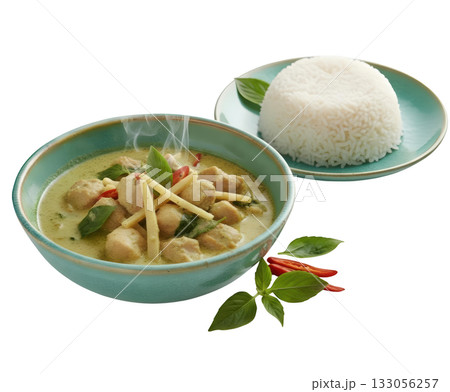 Appetizing Thai green curry chicken with savory basil and jasmine rice in glazed bowl, hot and comforting meal 133056257