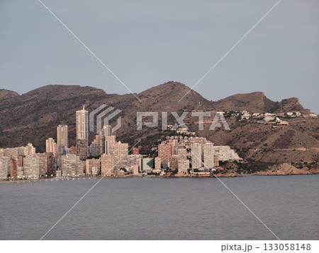 scenic hillside condominium group with peaceful sea vistas and dense mountain tower surroundings 133058148