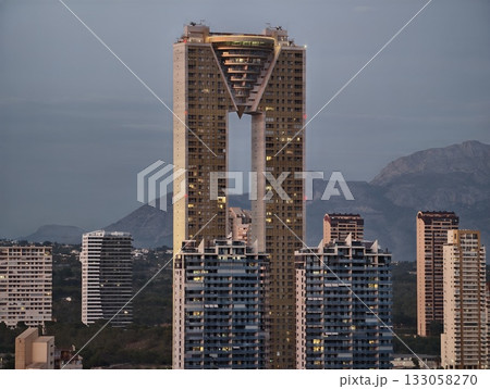 skyline towers glow, elegant urban residential structures, illuminated towers with bridging skyline towers glow, elegant urban residential structures, illuminated towers with bridging 133058270
