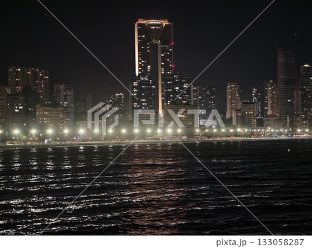 night city reflections, calm harbor scenes showcasing bright buildings and gentle ripples in water night city reflections, calm harbor scenes showcasing bright buildings and gentle ripples in water 133058287