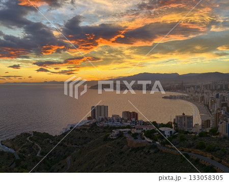 beautiful sunset over tranquil bay showcasing luxury accommodations and inviting travel 133058305