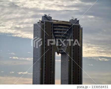 urban skyline focal point showcasing bold geometric shapes and dramatic natural lighting effects urban skyline focal point showcasing bold geometric shapes and dramatic natural lighting effects 133058431
