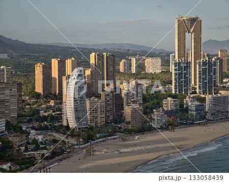 seaside retreat with unique architecture, vacation destination featuring sunlit terraces and lush seaside retreat with unique architecture, vacation destination featuring sunlit terraces and lush 133058439