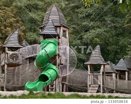 vivid architectural snapshot, architectural focus featuring vibrant play structures and safety 133058638