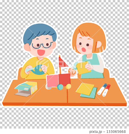 Elementary school boys and girls sitting at a desk and working together Elementary school boys and girls sitting at a desk and working together 133065668