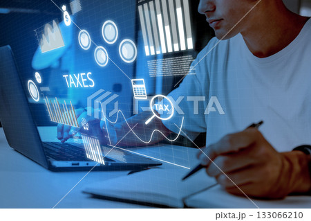 Working on tax planning with digital tools and financial data analysis Working on tax planning with digital tools and financial data analysis 133066210