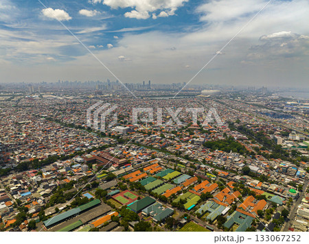 Slums and skyscrapers in Jakarta. City Landscape. Indonesia. 133067252