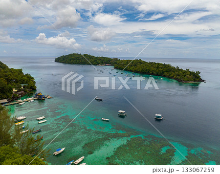 Aerial drone of Rubiah island with jungle and blue sea. Aceh, Indonesia. 133067259