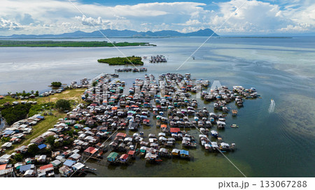 Aerial view of village of fishermen and farmers on the water in Asia. Borneo,Semporna. Sabah, Malaysia. Aerial view of village of fishermen and farmers on the water in Asia. Borneo,Semporna. Sabah, Malaysia. 133067288