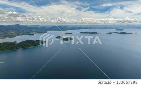 Aerial view of jungle coastline and bay with islands. Borneo. Sabah, Malaysia. Aerial view of jungle coastline and bay with islands. Borneo. Sabah, Malaysia. 133067295