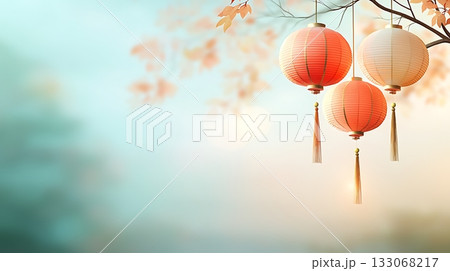 Colorful paper lanterns hanging from branches with soft focus background and gentle light 133068217