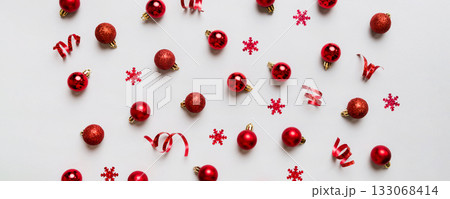 Christmas composition. a pattern of christmas balls on colored background. Flat lay, top view New year decor Christmas composition. a pattern of christmas balls on colored background. Flat lay, top view New year decor 133068414