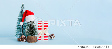 Christmas composition. craft Gift box, small tree, branches and craft DIY decorations on white background. New year concept. Christmas home decoration Flat lay, top view, copy space Christmas composition. craft Gift box, small tree, branches and craft DIY decorations on white background. New year concept. Christmas home decoration Flat lay, top view, copy space 133068613