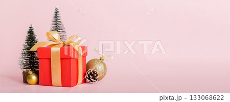 Christmas composition. craft Gift box, small tree, branches and craft DIY decorations on white background. New year concept. Christmas home decoration Flat lay, top view, copy space Christmas composition. craft Gift box, small tree, branches and craft DIY decorations on white background. New year concept. Christmas home decoration Flat lay, top view, copy space 133068622